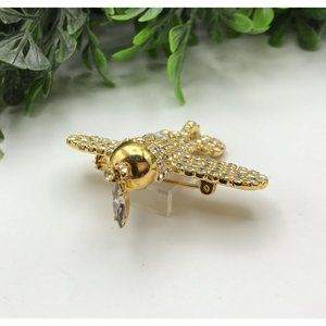 Airplane Brooch by Dorothy Bauer gold tone covered with clear rhinestones Broken